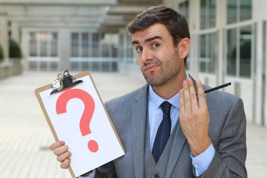 Confused businessman with a major question