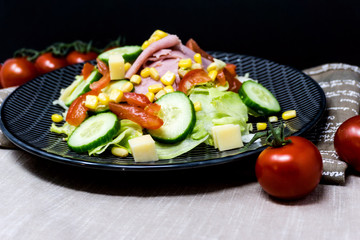 Fresh fruits salad and ham with egg