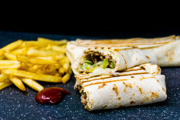 beef tacos served with golden French fries