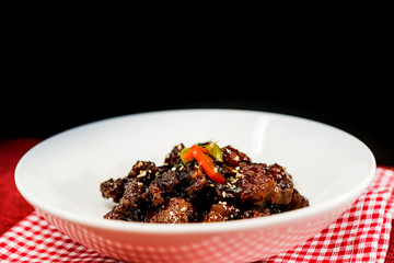 wok fried chicken stir fry with sweet peppers and chinese vegetables