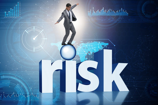 Young businessman in business risk and uncertainty concept