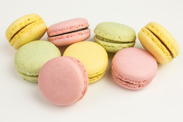 french sweet macarons  in pink, yellow and green