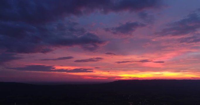 4K Aerial view of Beautiful sunset sky and cloud changing the twilight color.Timelapse shot.