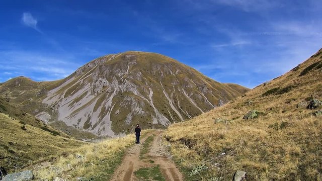 Young woman hiking in Macedonian mountains near Labunishta, Macedonia