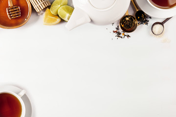 Obraz na płótnie Canvas Background of tea composition with crockery