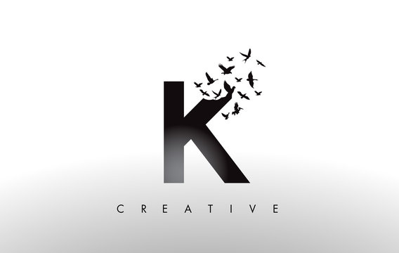 K Logo Letter with Flock of Birds Flying and Disintegrating from the Letter.