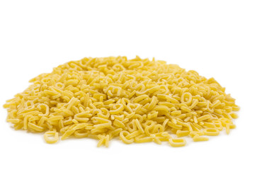 pile of raw pasta in the form of letters and numbers