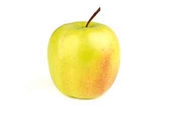 one ripe juicy yellow apple on a white background