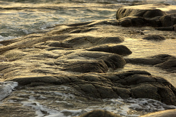 The coast, with stone boulders. Barents sea, Russia.