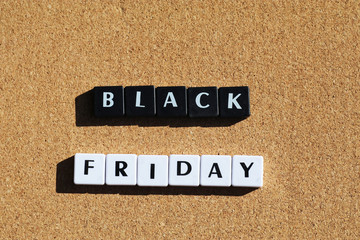 Obraz premium Close up of letter tiles spelling Black Friday