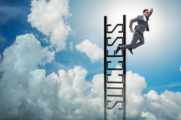 Businessman slipping from the top of ladder