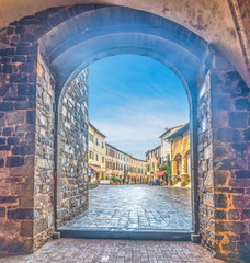 Rustic arch in a small village in Tuscany