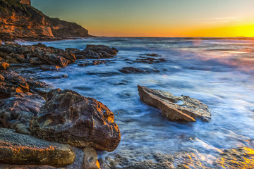 Rocky shore at sunset