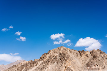 Closeup image of mountains and blue sky background in Ladakh , India