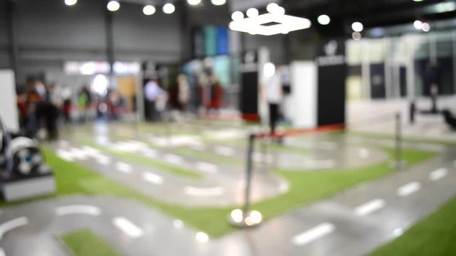 background blur ride a gyroscope on marked paths inside the building