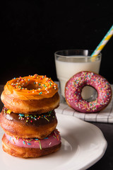 Donuts with glass of milk.