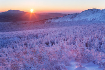Snowy winter landscape in the mountains. National Park Taganay. Southern Urals. Russia.