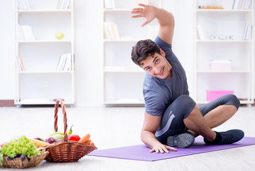 Man promoting the benefits of healthy eating and doing sports