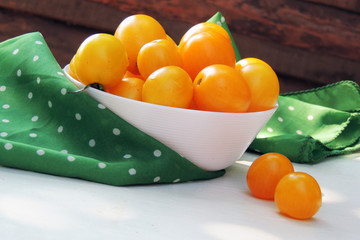Yellow tomatoes in a plate