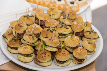 various canapés served on the table, close up