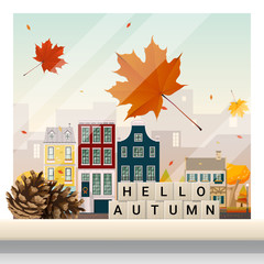 Letters spelling hello autumn on wooden table top with autumn cityscape background , vector , illustration