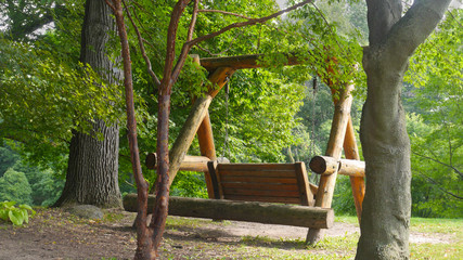 Wood swing in park