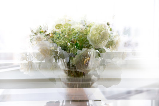Beautiful rose and flowers bouquet in vase. Multiple exposure image