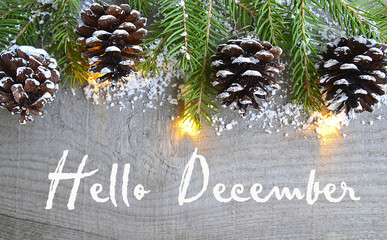 Hello December.Christmas decoration on old wooden background.Winter holidays concept.Selective focus. © svf74