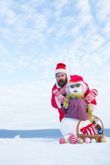 Surprised hipster in red xmas costume