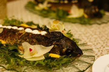 Fototapeta na wymiar Stuffed fish on banquet
