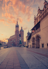 Fototapeta na wymiar St Mary's church and Cloth Hall on Main Market Square in Krakow, on colorful morning