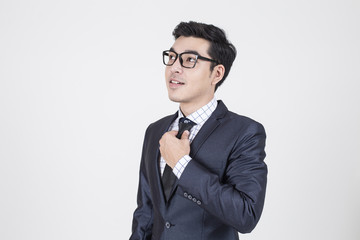 Asian Businessman standing on White Background with Success feeling, Business Success Concept, isolated on white background.