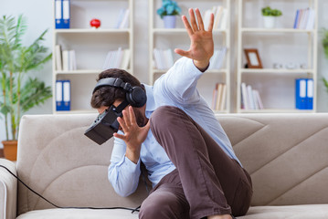 Student gamer playing games at home