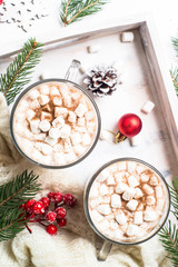 Obraz na płótnie Canvas Christmas hot chocolate or cocoa with marshmallow on white.