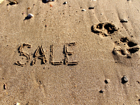 inscription sale on the sand