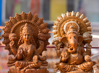 clay idols of laxmi and ganesh