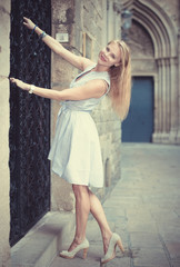 portrait of cheerful female near the door