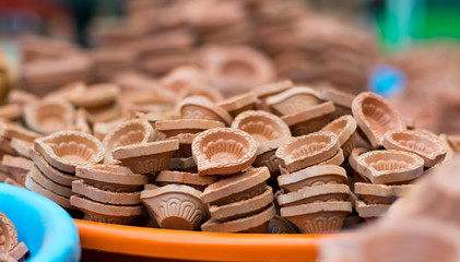 clay oil lamps stacked