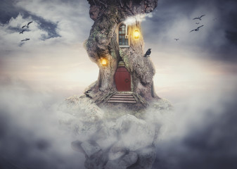 Fairy tree house on rock flying in fantasy sky
