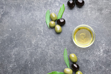 Bowl with olive oil on grunge table