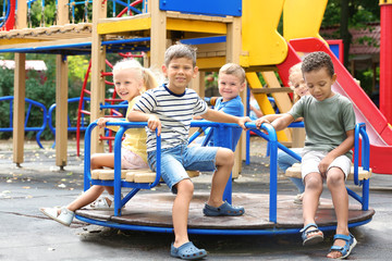 Fototapeta na wymiar Cute children on playground
