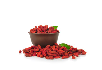Bowl with red dried goji berries on white background