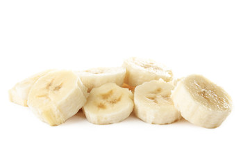 Delicious banana slices on white background