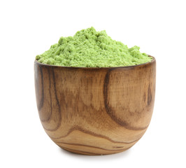 Bowl with wheat grass powder on white background