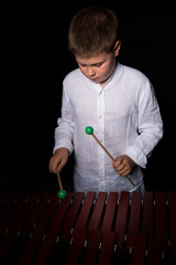 louis playing xylophone