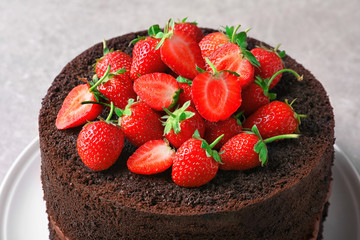 Plate with delicious chocolate cake on table, closeup
