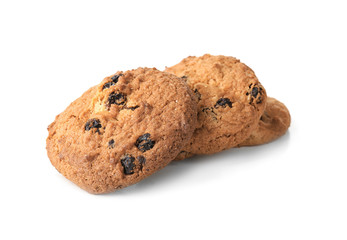 Delicious oatmeal cookies with raisins on white background