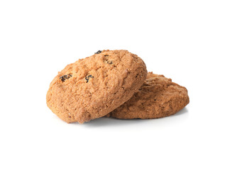 Delicious oatmeal cookies with raisins on white background