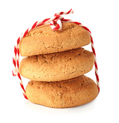 Delicious oatmeal cookies on white background
