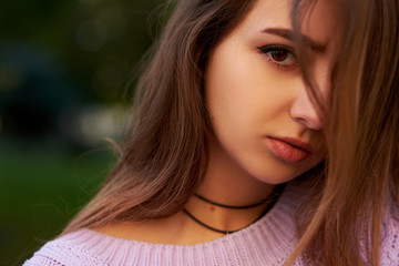 Shame and shyness facial expression. Shy girl hides her face